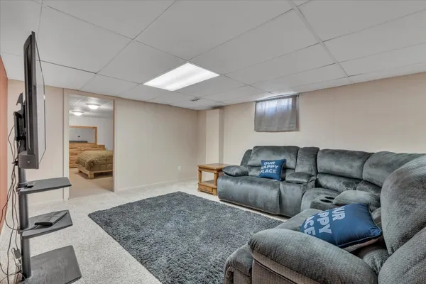 a living room with furniture and a couch