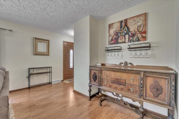 a view of a workspace with furniture