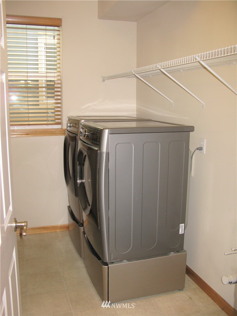 1219 187th Street Southeast Bothell, WA 98012 - Photo 20 of 39 a utility room with dryer and washer
