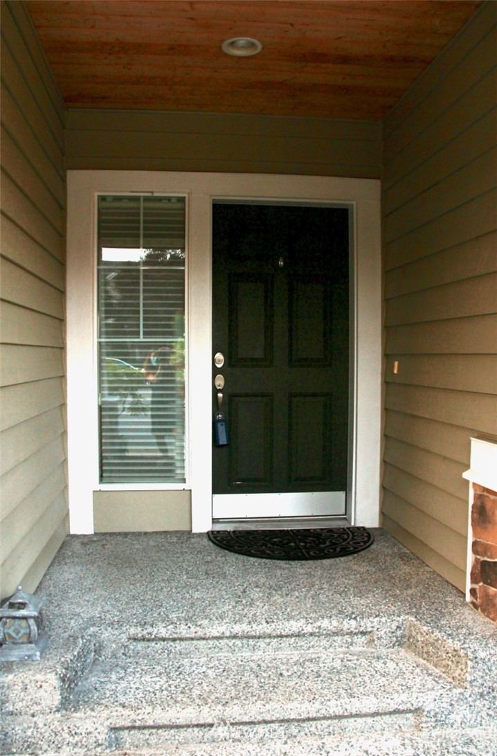 1219 187th Street Southeast Bothell, WA 98012 - Photo 3 of 39 a view of a entryway of the house
