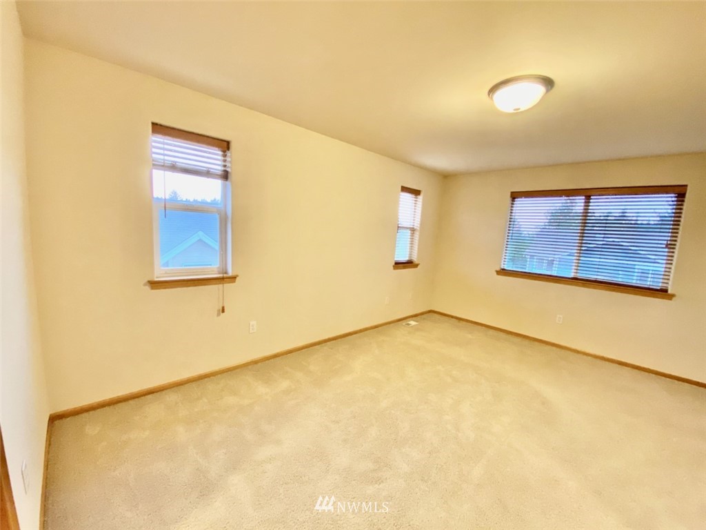 1219 187th Street Southeast Bothell, WA 98012 - Photo 30 of 39 a view of a room with a large window