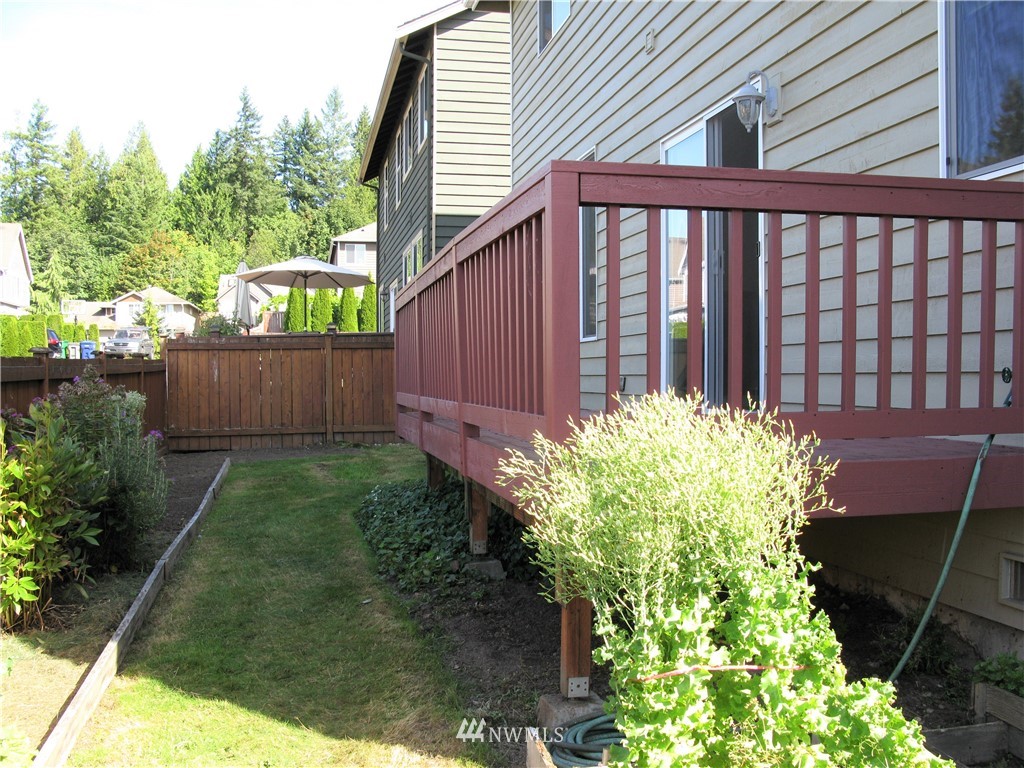 1219 187th Street Southeast Bothell, WA 98012 - Photo 37 of 39 a view of a backyard with plants