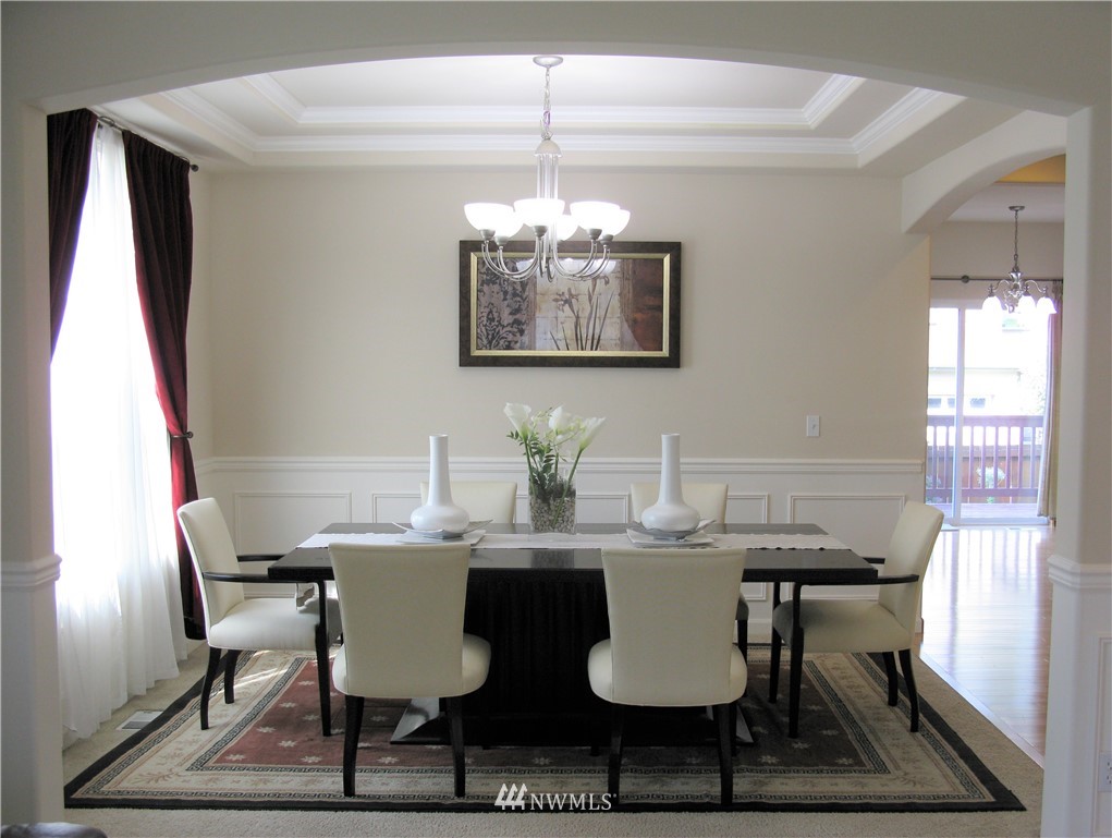 1219 187th Street Southeast Bothell, WA 98012 - Photo 5 of 39 a dining room with furniture and window