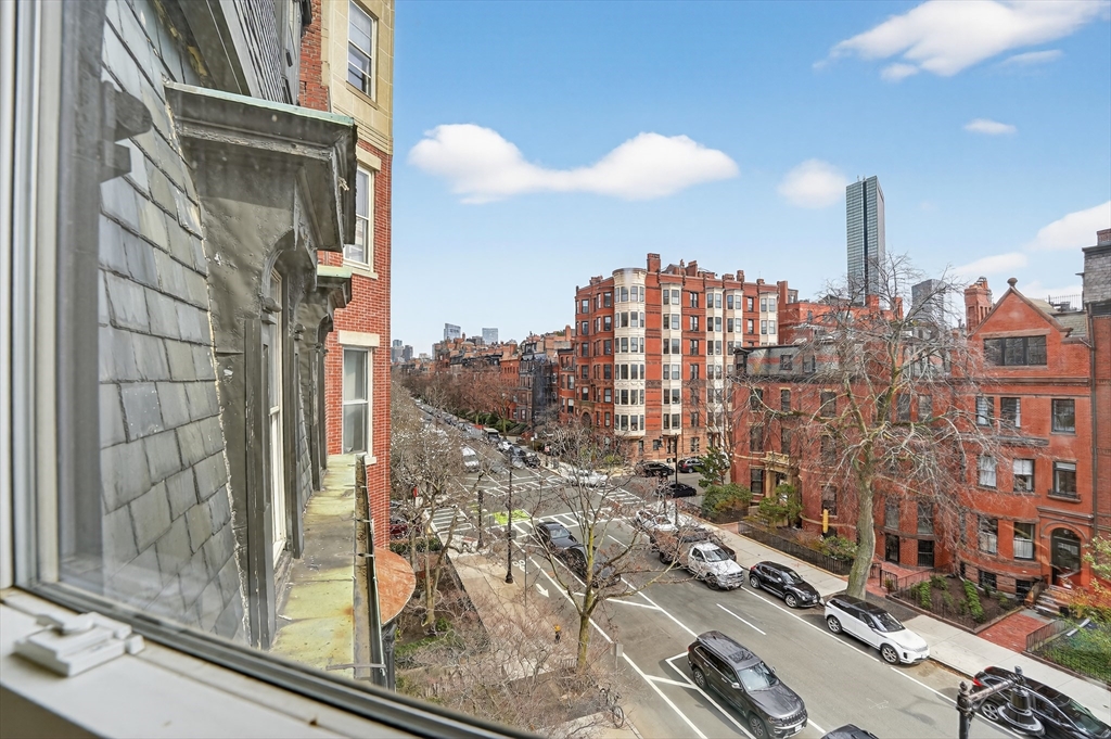 290 Beacon Street, Unit 4 Boston, MA 02116 - Photo 11 of 12 a view of a city with tall buildings