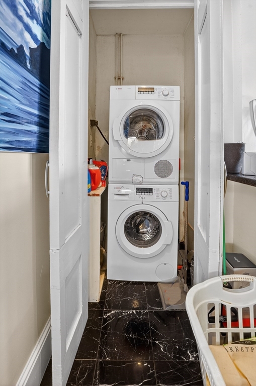 290 Beacon Street, Unit 4 Boston, MA 02116 - Photo 4 of 12 a utility room with dryer and washer