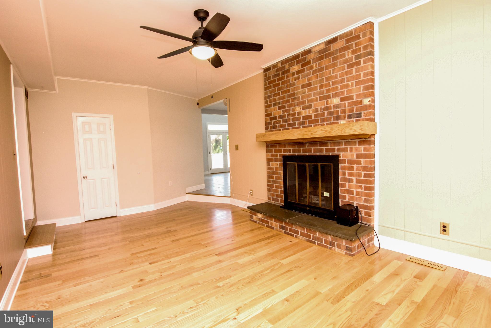 614 Venture Road Hockessin, DE 19707 - Photo 13 of 47 Notice the wood floors!