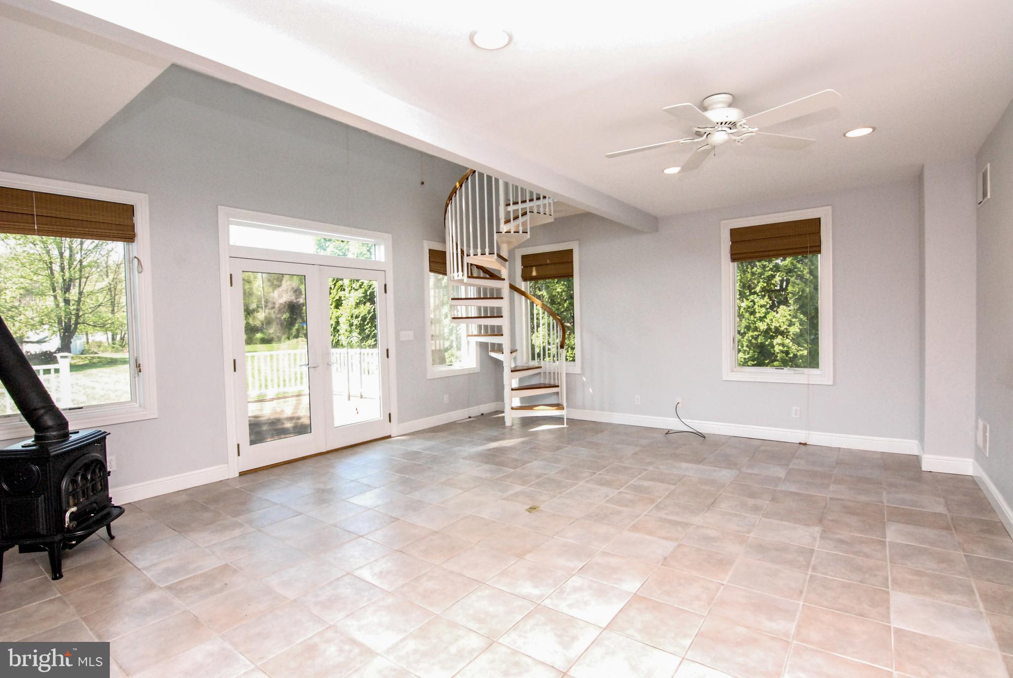 614 Venture Road Hockessin, DE 19707 - Photo 15 of 47 Great room with French doors to deck