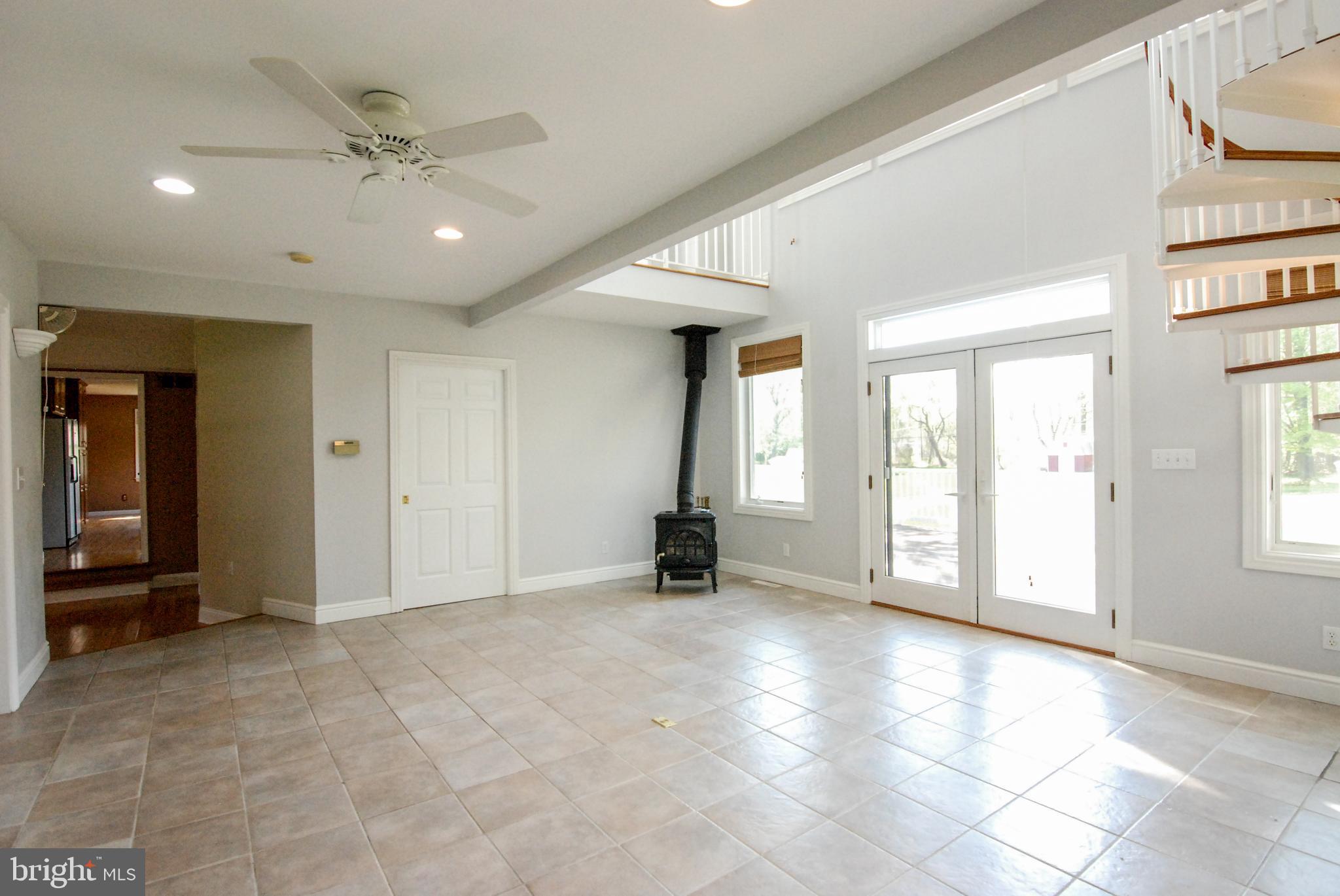 614 Venture Road Hockessin, DE 19707 - Photo 16 of 47 Great room with wood-stove