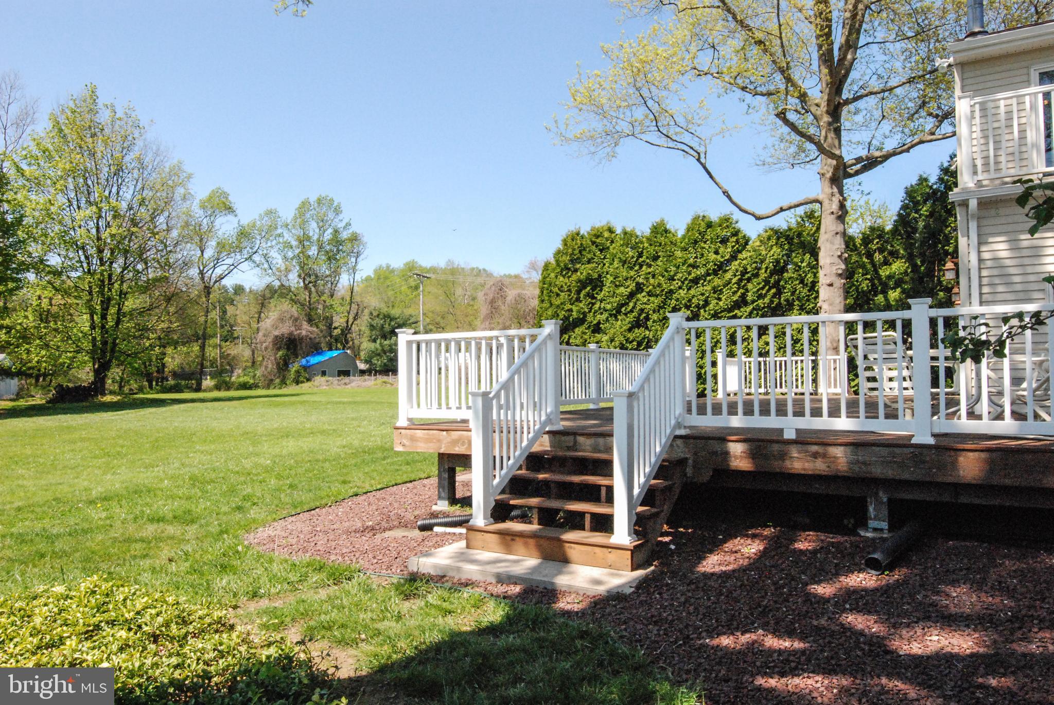 614 Venture Road Hockessin, DE 19707 - Photo 38 of 47 Back deck and part of .8 acre yard!