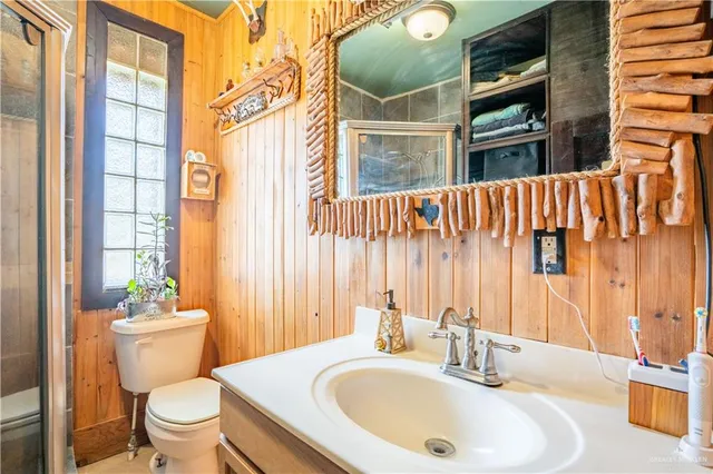 a bathroom with a sink and a toilet