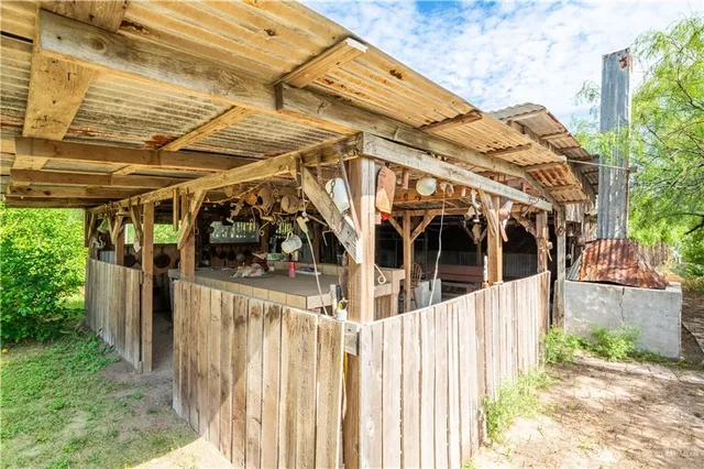 a view of a house with a small yard