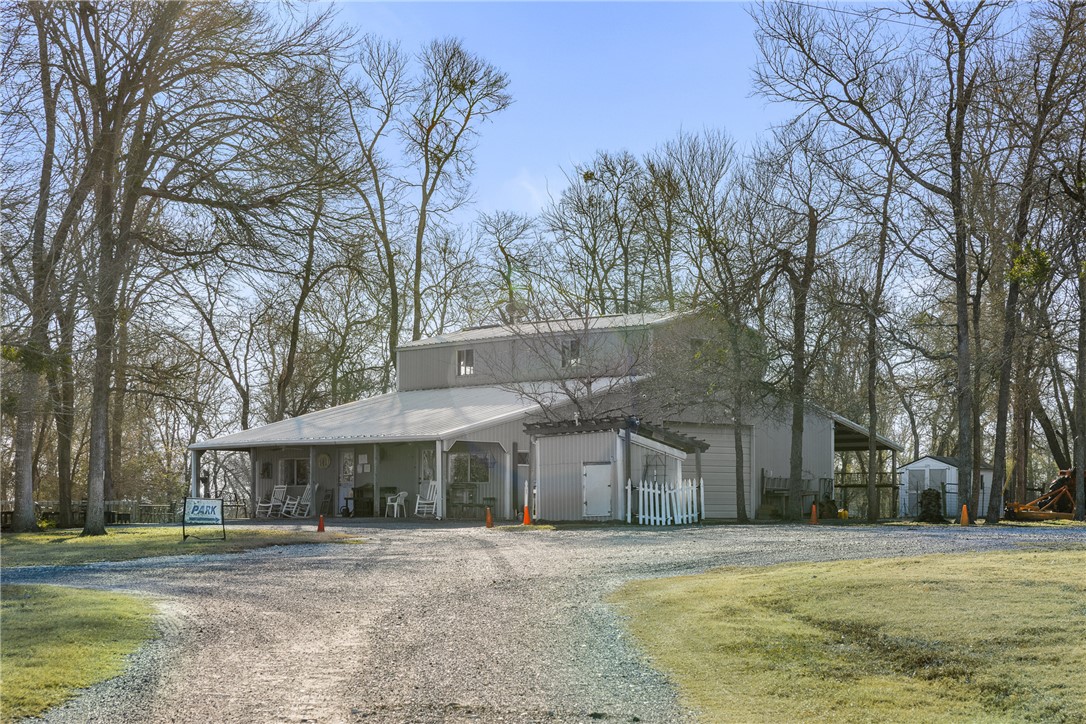 2250 Dillard Road Washington, TX 77880 - Photo 36 of 50 a front view of a house with a yard