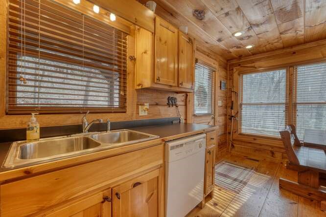 76 Channing Hollow Morganton, GA 30560 - Photo 13 of 47 a kitchen that has a sink and a large window