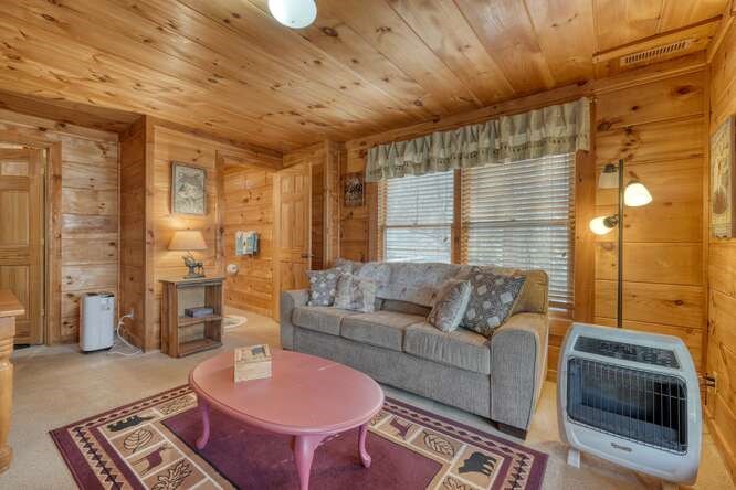 76 Channing Hollow Morganton, GA 30560 - Photo 25 of 47 a living room with furniture and a fireplace