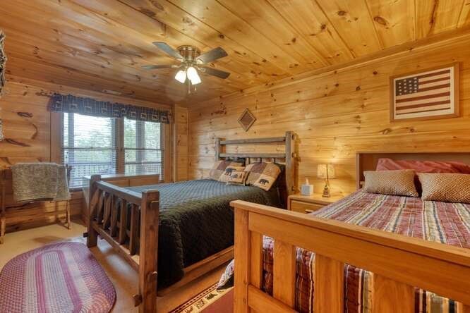 76 Channing Hollow Morganton, GA 30560 - Photo 28 of 47 a bedroom with a bed next to a window