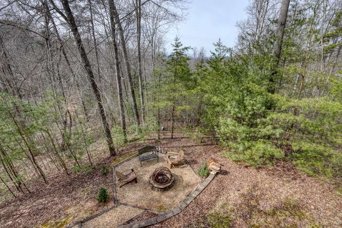 76 Channing Hollow Morganton, GA 30560 - Photo 38 of 47 a view of a backyard with wooden fence