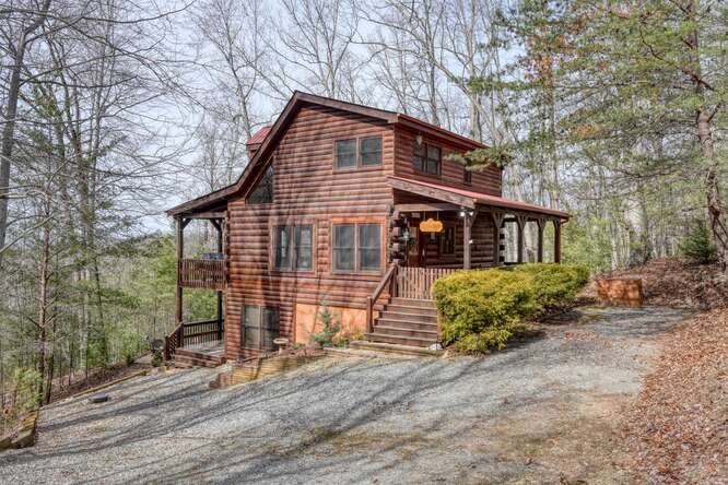 76 Channing Hollow Morganton, GA 30560 - Photo 47 of 47 a front view of a house with a garden