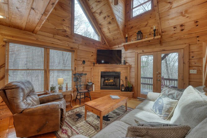 76 Channing Hollow Morganton, GA 30560 - Photo 6 of 47 a living room with furniture fireplace and a large window