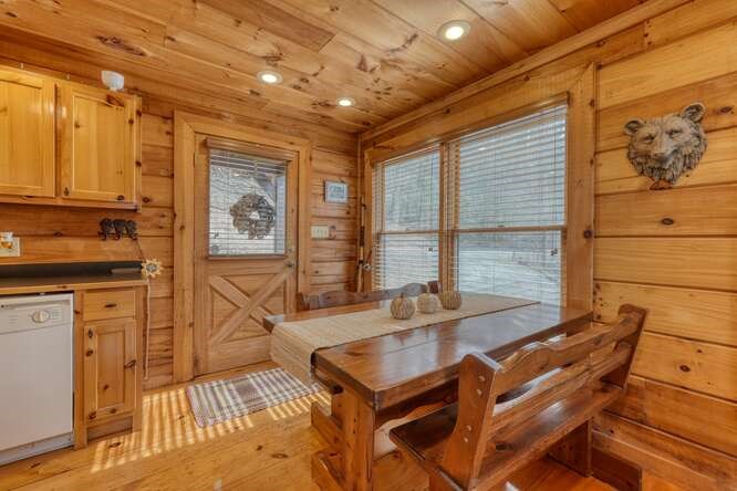 76 Channing Hollow Morganton, GA 30560 - Photo 9 of 47 a room with table chairs and a stove