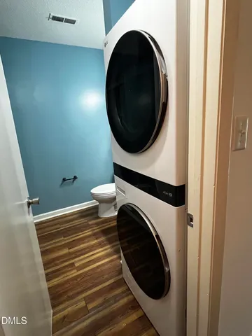 a view of a hallway with washer and dryer