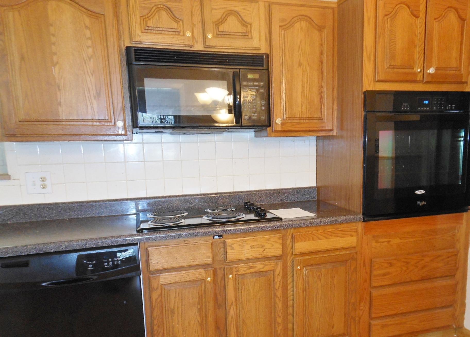 7709 Whitcomb Road Powell, TN 37849 - Photo 12 of 13 Nice wood cabinets in kitchen