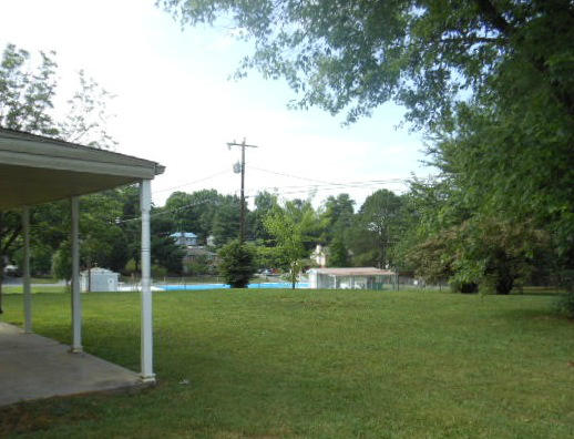 7709 Whitcomb Road Powell, TN 37849 - Photo 8 of 13 Walk to the neighborhood pool