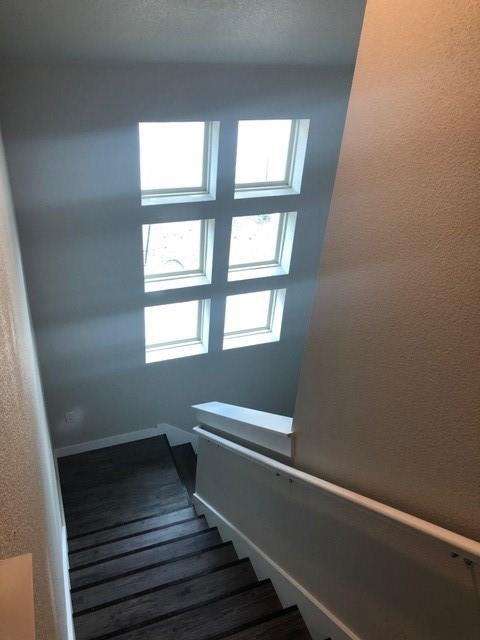 2309 North Elm Street Denton, TX 76201 - Photo 7 of 8 a hallway with wooden floor and a window