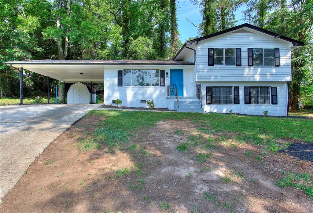 4116 Yankton Court Decatur, GA 30034 - Photo 1 of 1 a front view of a house with a garden and yard