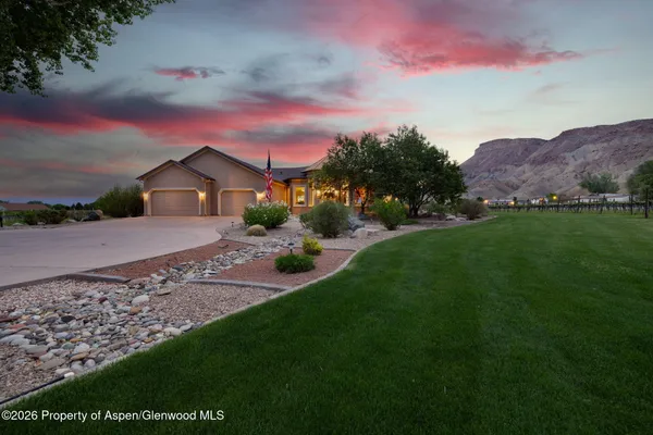 a view of a house with a big yard