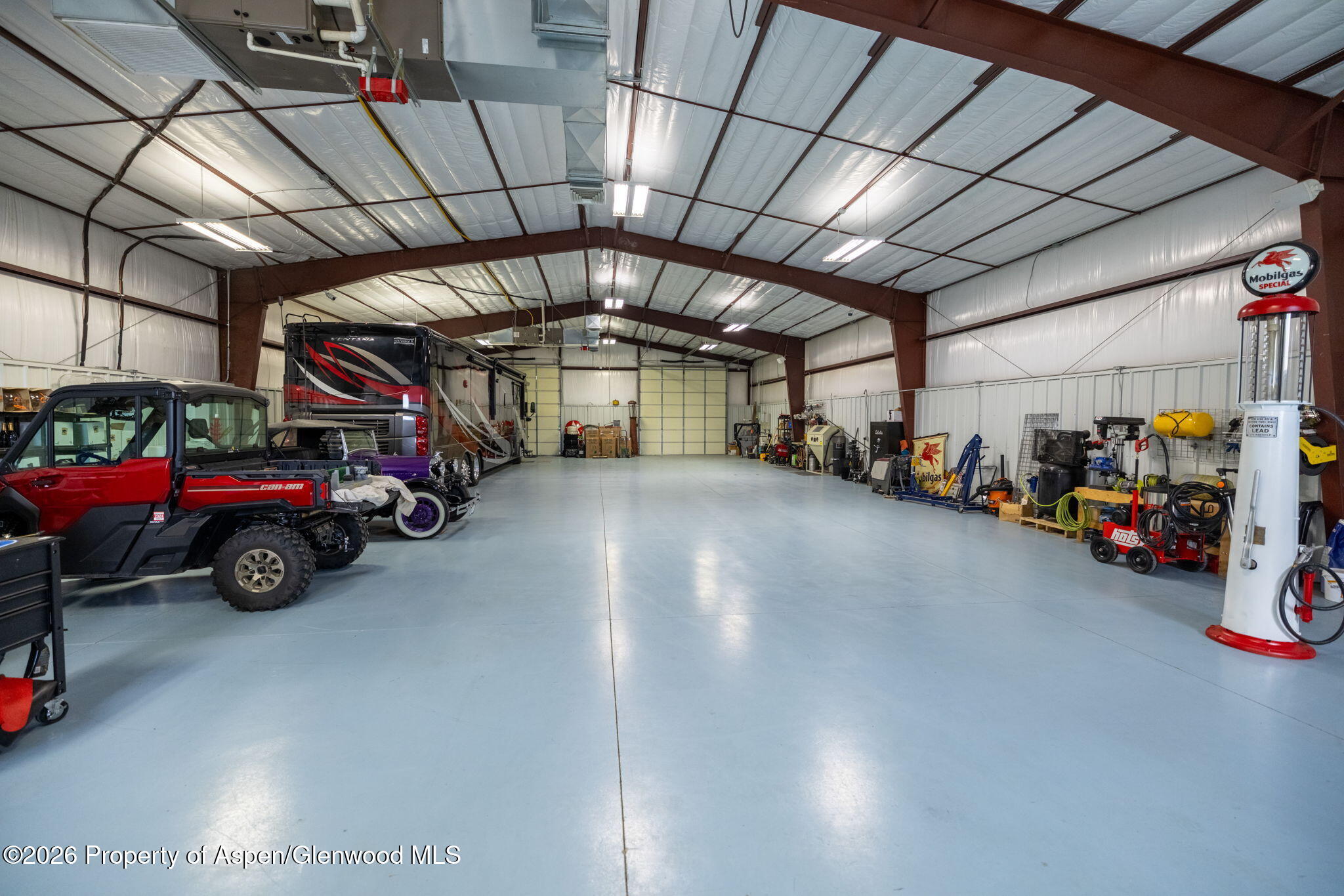 759 36 3/10 Road Palisade, CO 81526 - Photo 33 of 38 a view of a garage with parked cars