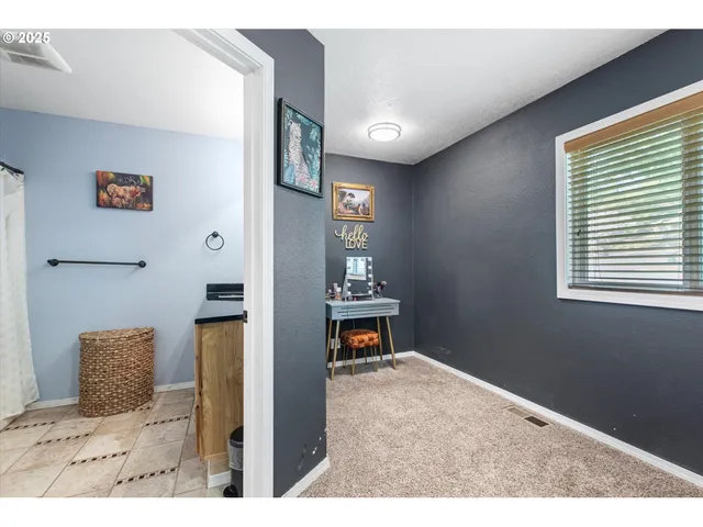 a workspace with furniture and window