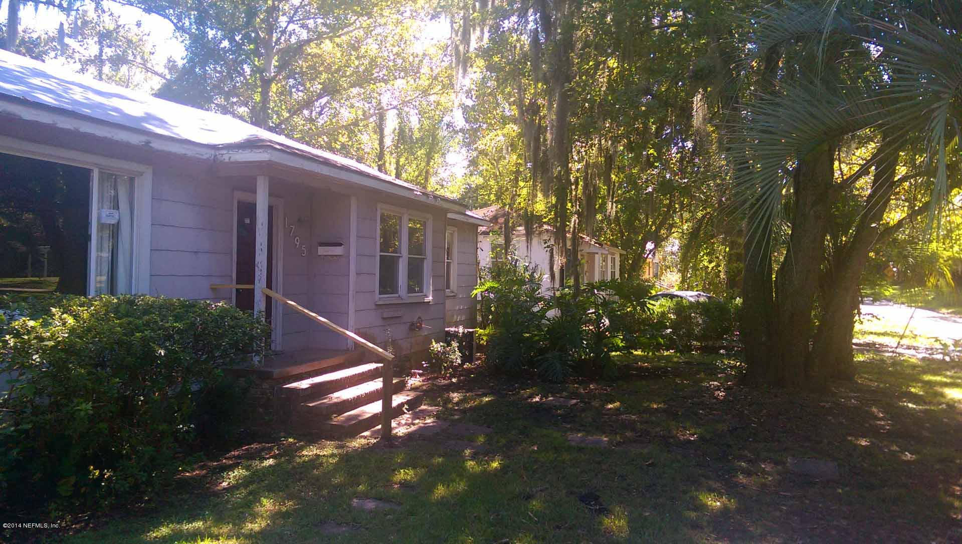 1795 Lilly Road East Jacksonville, FL 32207 - Photo 2 of 12 a view of a house with a yard