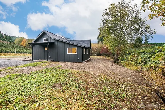 a house view with a garden space
