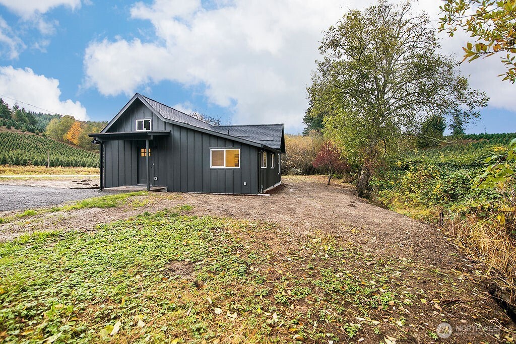 251 Swofford Road Mossyrock, WA 98564 - Photo 1 of 38 a house view with a garden space