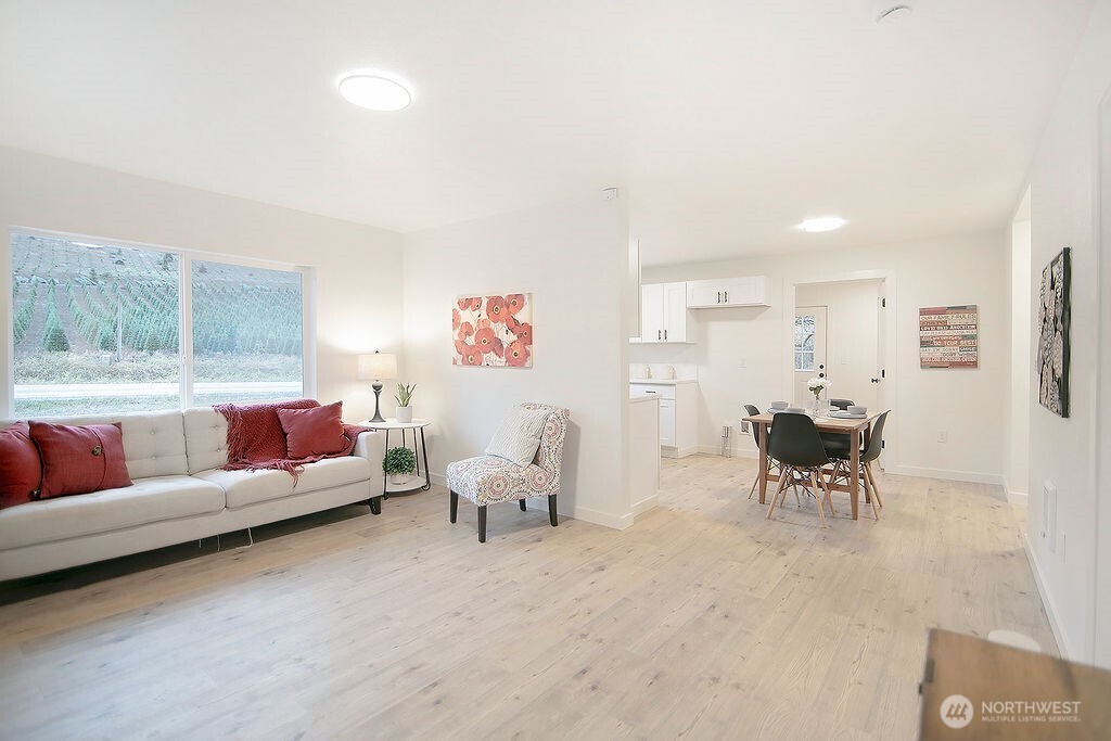 251 Swofford Road Mossyrock, WA 98564 - Photo 2 of 38 a living room with furniture and a table