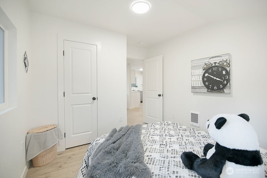 251 Swofford Road Mossyrock, WA 98564 - Photo 23 of 38 a bedroom with a bed and a cabinets