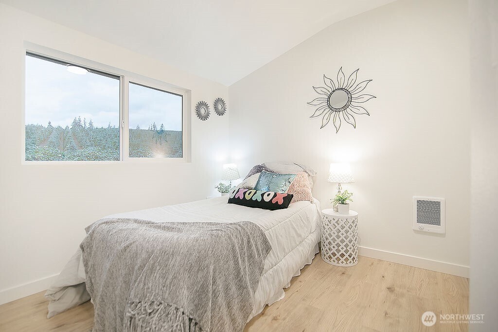 251 Swofford Road Mossyrock, WA 98564 - Photo 25 of 38 a bedroom with a bed and a window