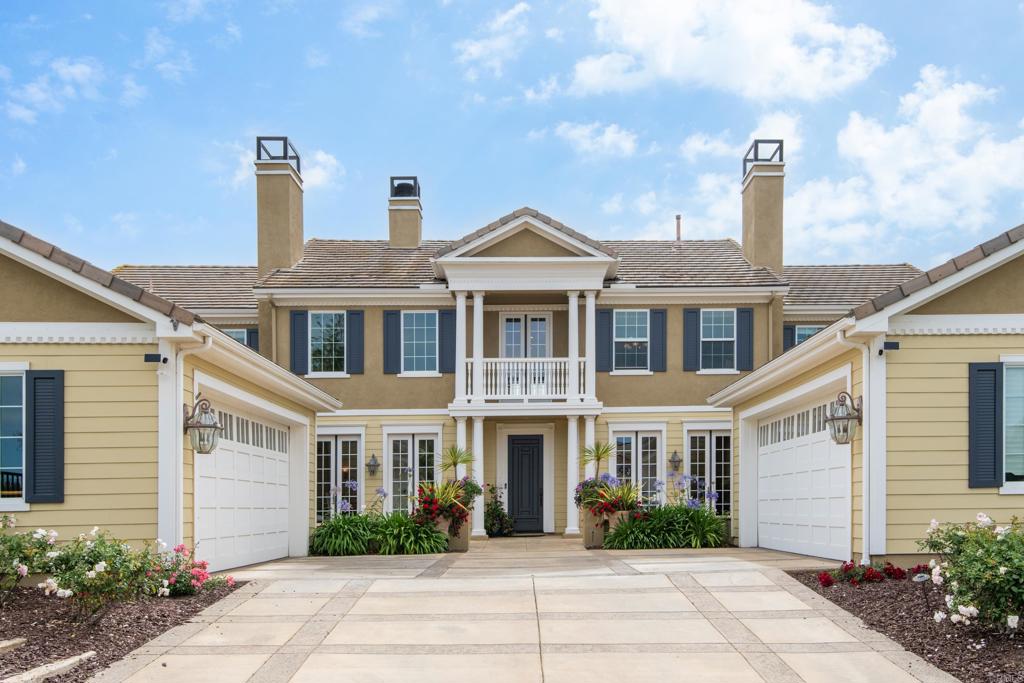 2541 Muirfields Drive Carlsbad, CA 92009 - Photo 48 of 58 a front view of a house with garden