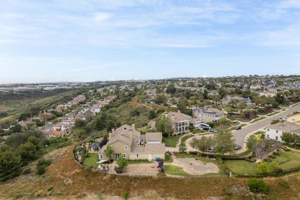 2541 Muirfields Drive Carlsbad, CA 92009 - Photo 54 of 58 an aerial view of a city with lots of residential buildings