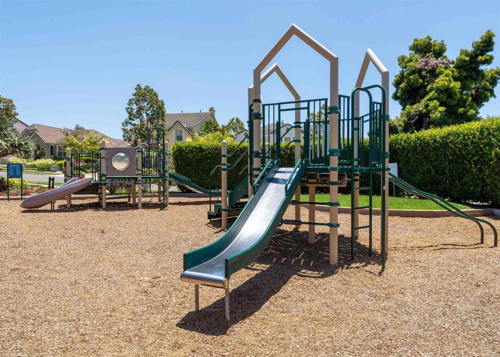 2541 Muirfields Drive Carlsbad, CA 92009 - Photo 58 of 58 a view of a swimming pool with a lounge chair