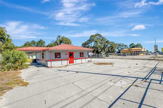 a house with trees in front of it