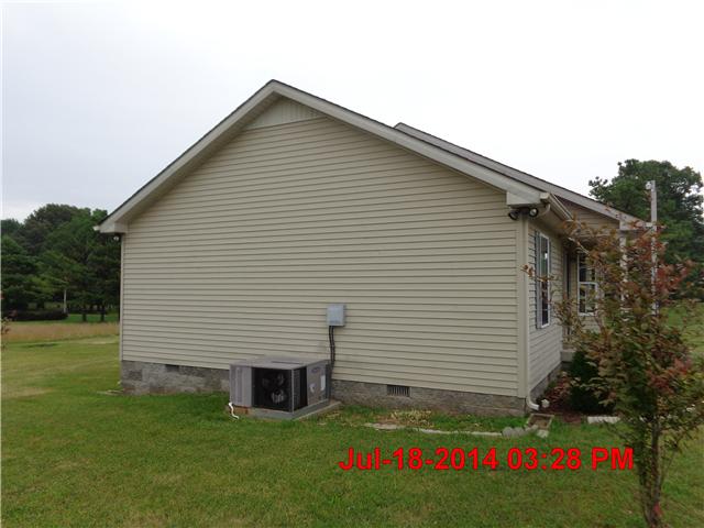 6142 Owens Chapel Road Springfield, TN 37172 - Photo 14 of 16 a front view of house with garden