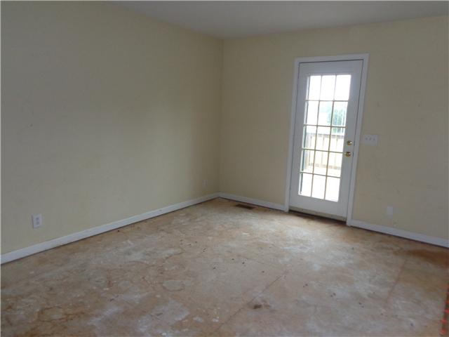 6142 Owens Chapel Road Springfield, TN 37172 - Photo 5 of 16 an empty room with a window