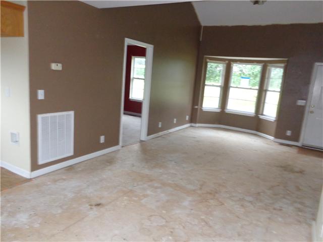 6142 Owens Chapel Road Springfield, TN 37172 - Photo 6 of 16 a view of an empty room with a window