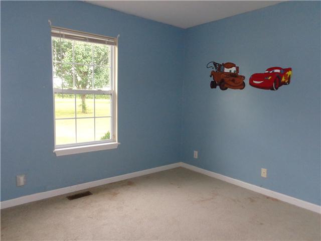 6142 Owens Chapel Road Springfield, TN 37172 - Photo 9 of 16 an empty room with a window
