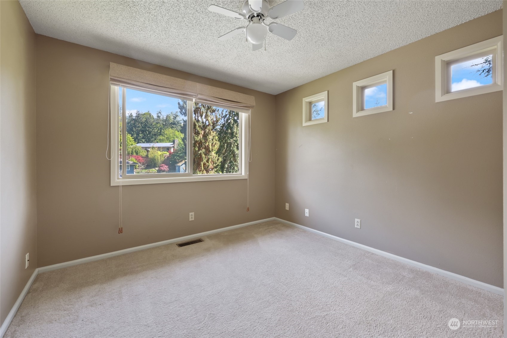 13835 17th Avenue Southwest Burien, WA 98166 - Photo 13 of 33 a view of room with window and ceiling fan