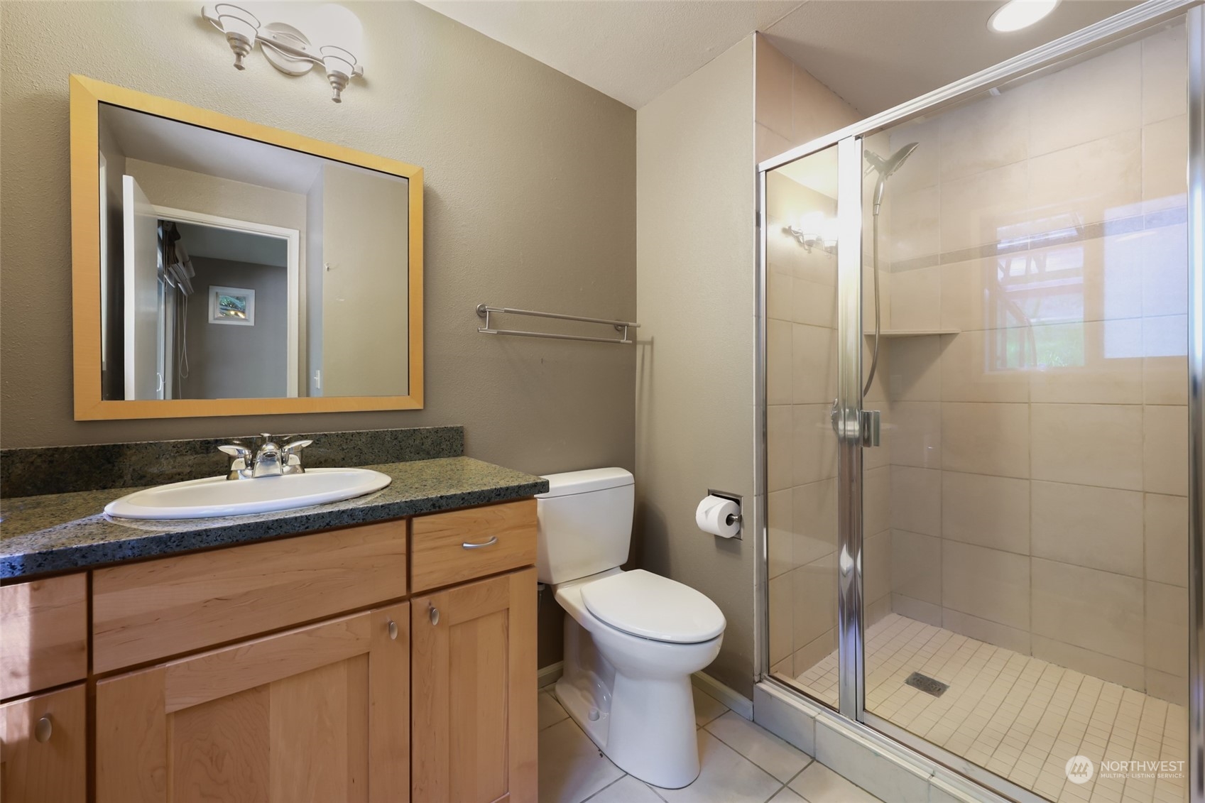 13835 17th Avenue Southwest Burien, WA 98166 - Photo 16 of 33 a bathroom with a toilet a sink and shower