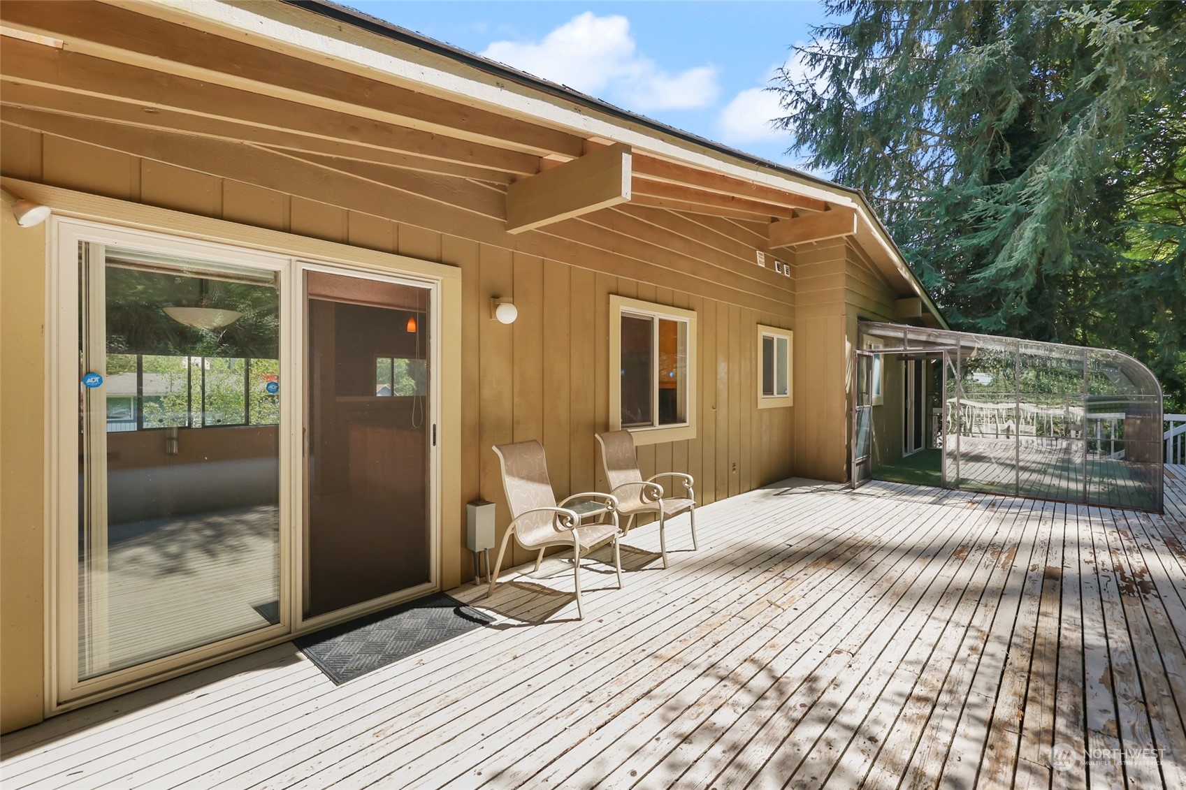 13835 17th Avenue Southwest Burien, WA 98166 - Photo 19 of 33 a bedroom with a bed and wooden floor