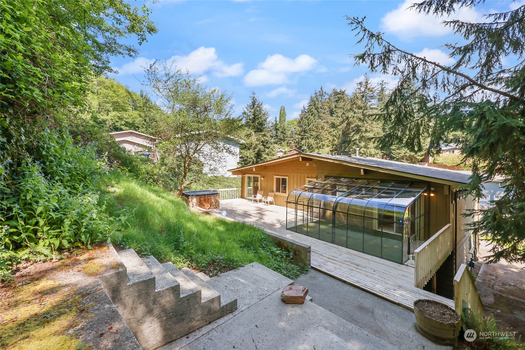 13835 17th Avenue Southwest Burien, WA 98166 - Photo 21 of 33 a front view of a house with a yard