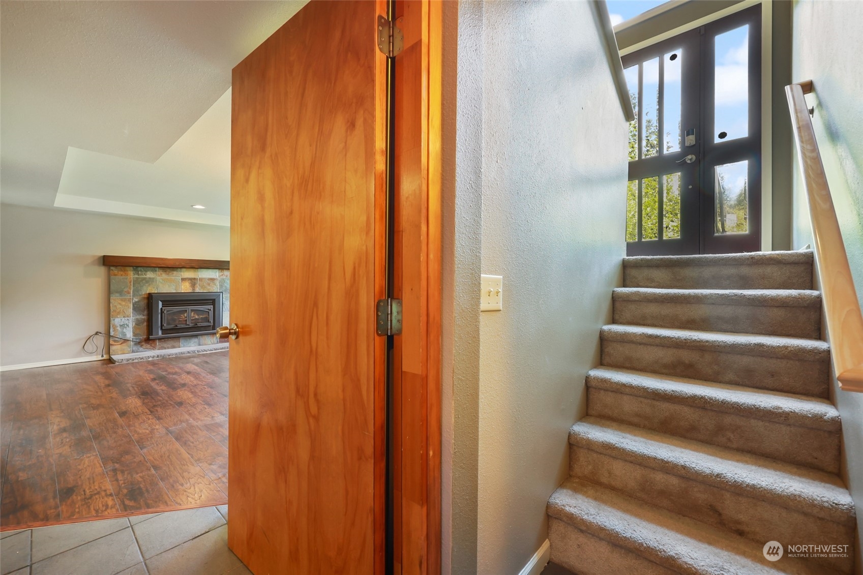 13835 17th Avenue Southwest Burien, WA 98166 - Photo 23 of 33 a view of entryway and hall with wooden floor